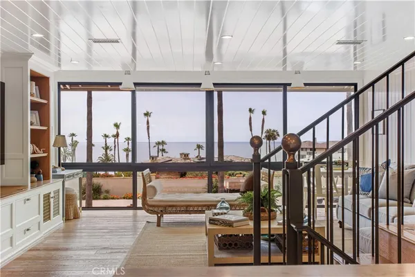 a kitchen with cabinets and window
