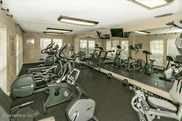 a view of a room with gym equipment
