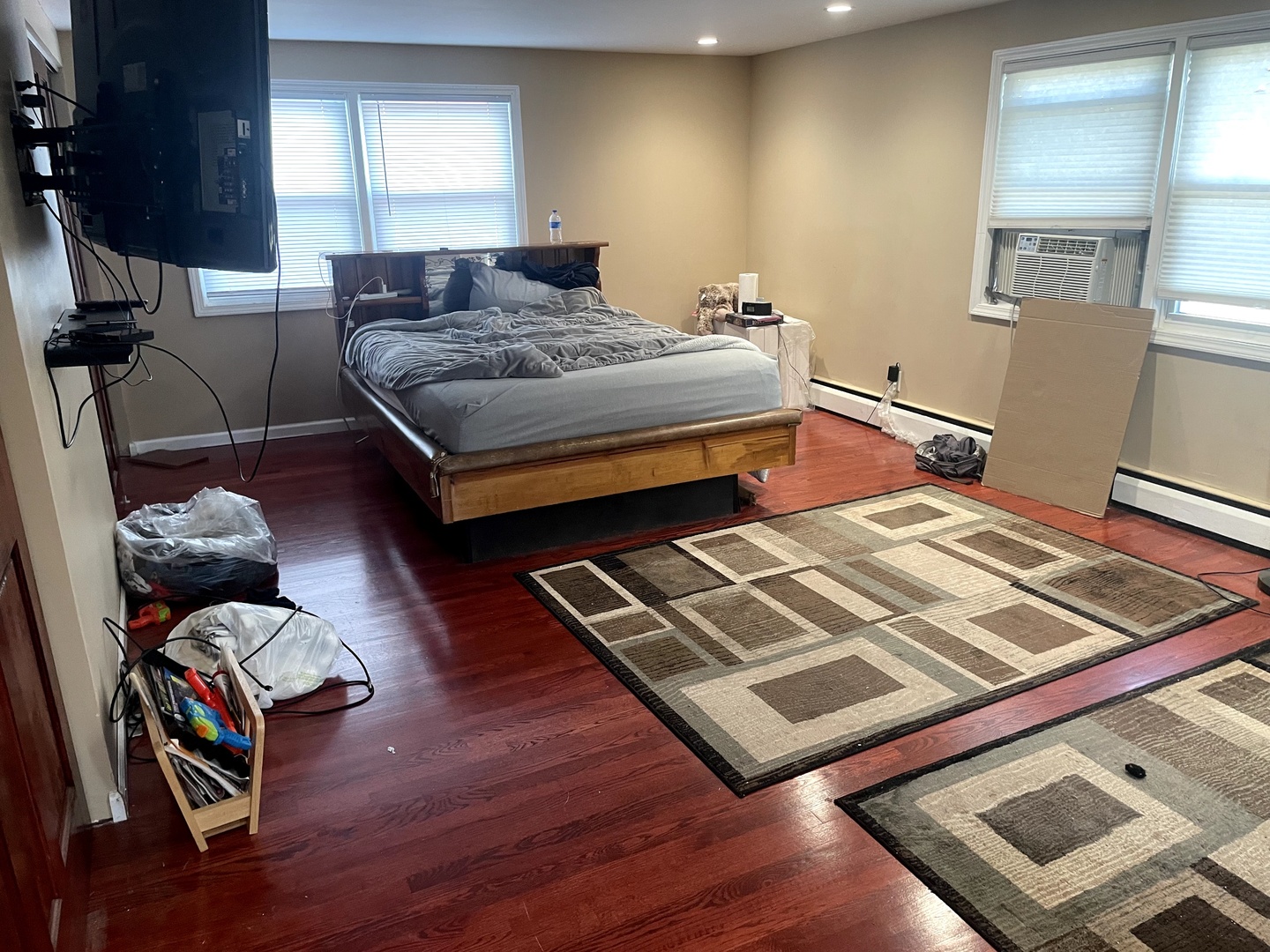 9803 West 57th Street Countryside, IL 60525 - Photo 8 of 13 a bedroom with furniture and a book shelf