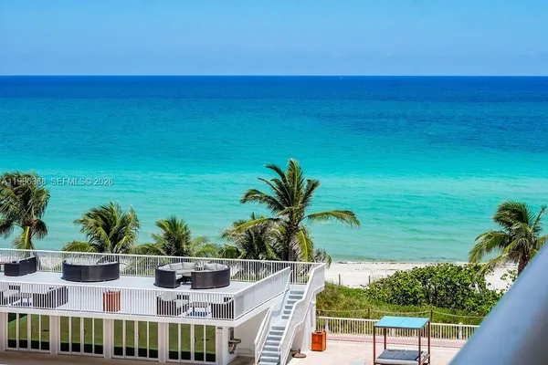 a view of a house with a ocean view