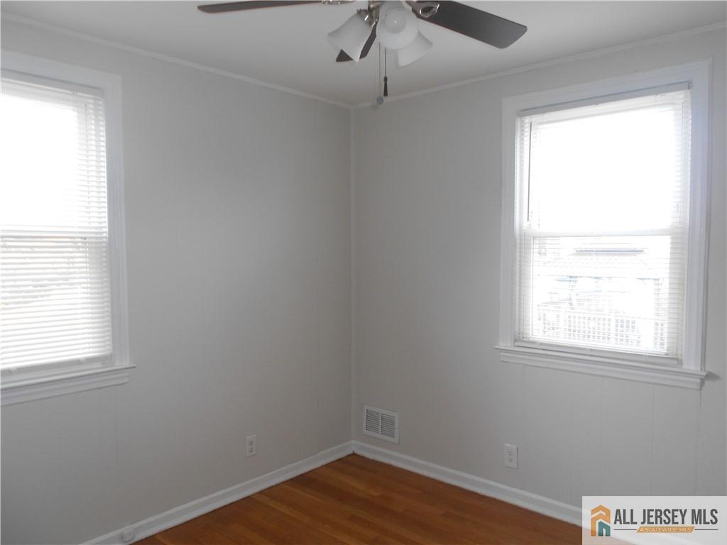 431 Crows Mill Road Fords, NJ 08863 - Photo 15 of 20 an empty room with a window