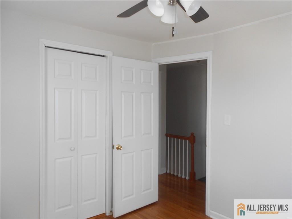 431 Crows Mill Road Fords, NJ 08863 - Photo 16 of 20 a view of a hallway with wooden floor