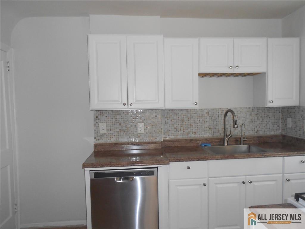 431 Crows Mill Road Fords, NJ 08863 - Photo 9 of 20 a kitchen with a sink and cabinets