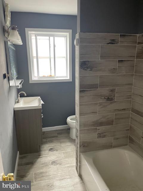 7117 Atlantic Avenue Upper Darby, PA 19082 - Photo 16 of 17 a bathroom with a sink toilet and shower