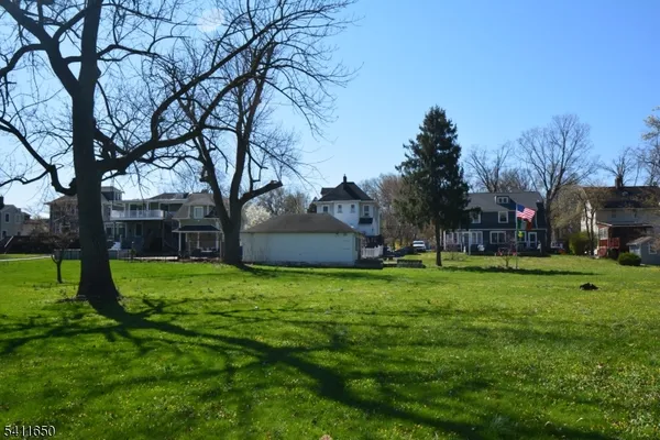 a fire hydrant in the middle of a field
