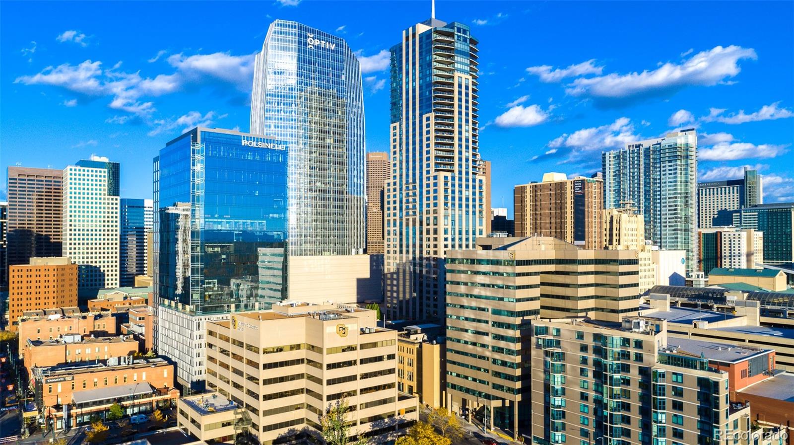 a view of city with tall buildings