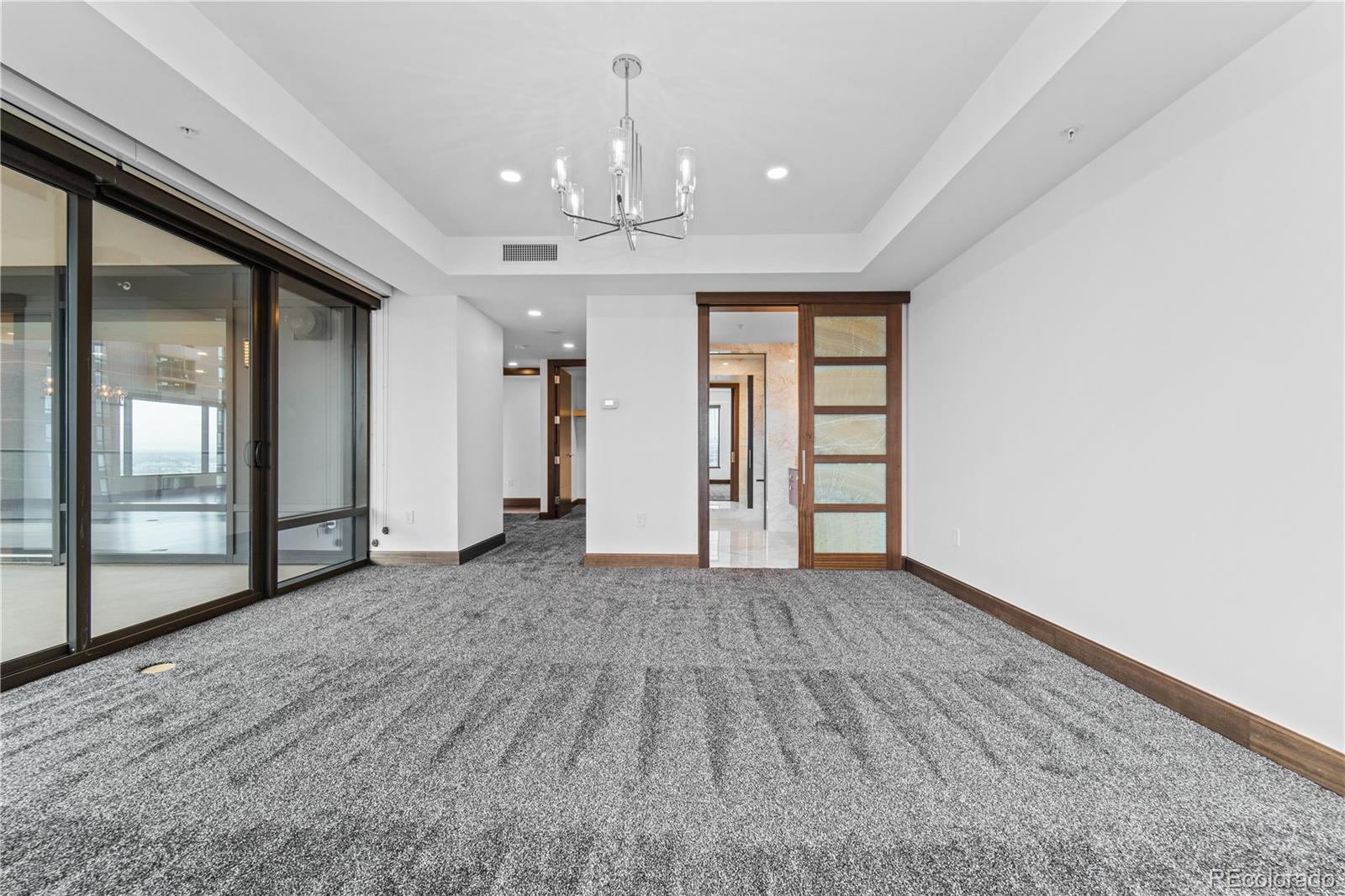 1133 14th Street, Unit 2620 Denver, CO 80202 - Photo 15 of 43 wooden floor in an empty room with a window