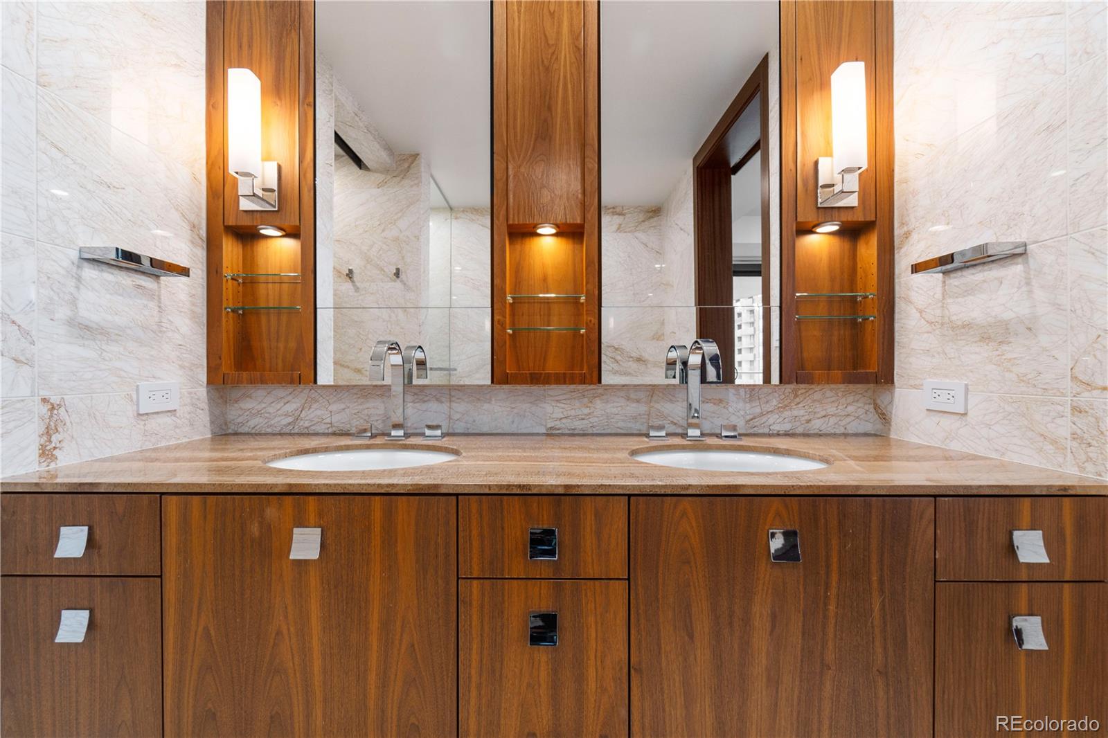 1133 14th Street, Unit 2620 Denver, CO 80202 - Photo 18 of 43 a bathroom with a granite countertop sink and a mirror