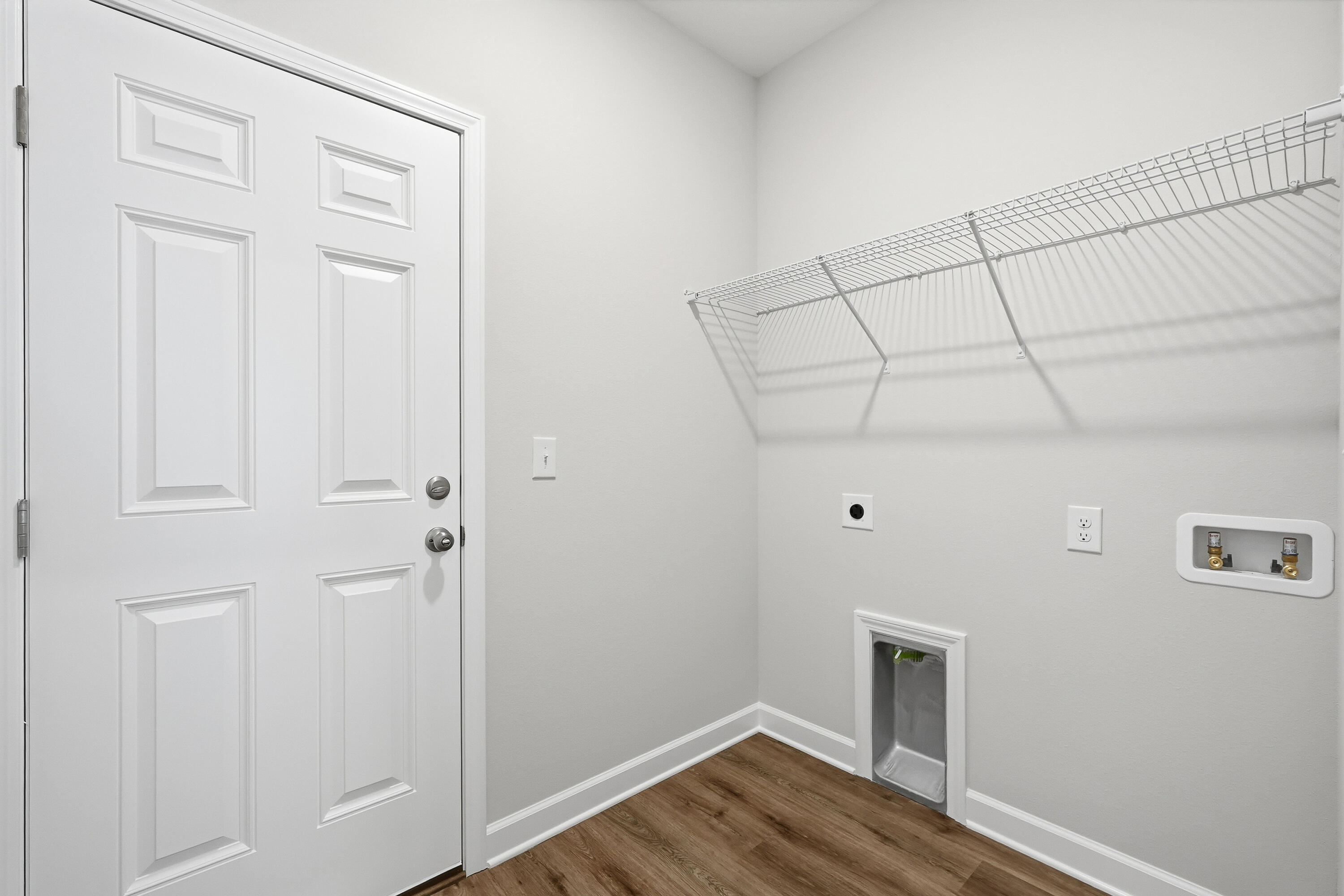 6106 Mildred's Way Crestview, FL 32539 - Photo 24 of 31 a view of a room with wooden floor