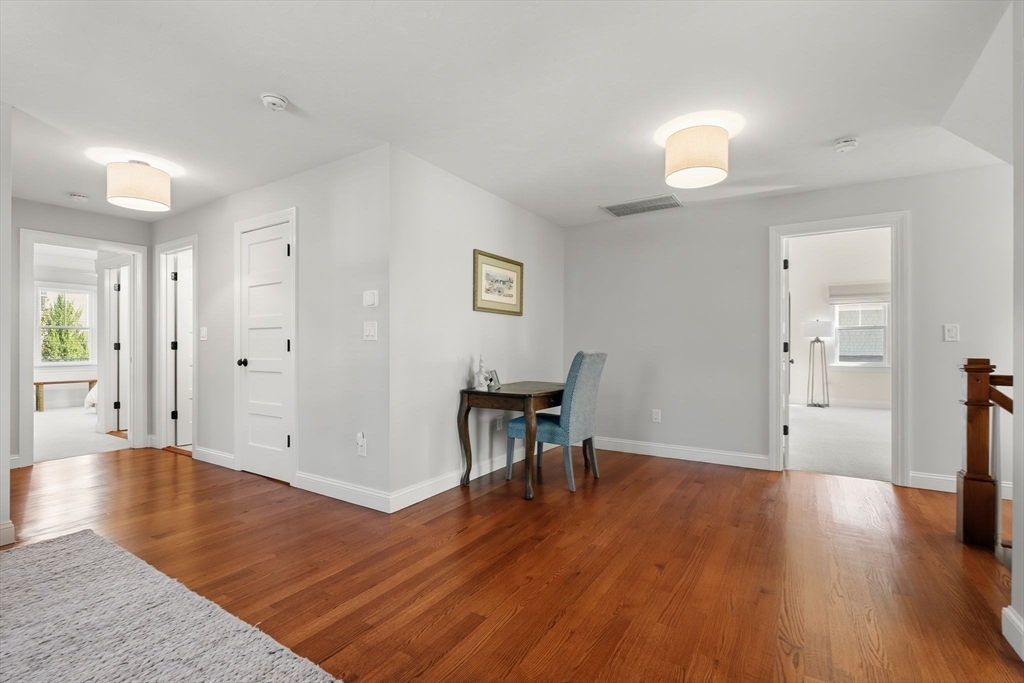 37 Moorland Road Scituate, MA 02066 - Photo 16 of 38 a view of a livingroom with wooden floor and furniture