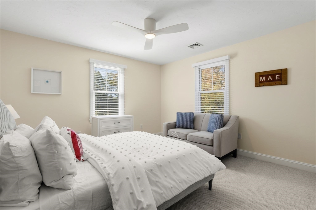 37 Moorland Road Scituate, MA 02066 - Photo 21 of 38 a bedroom with a bed and a couch