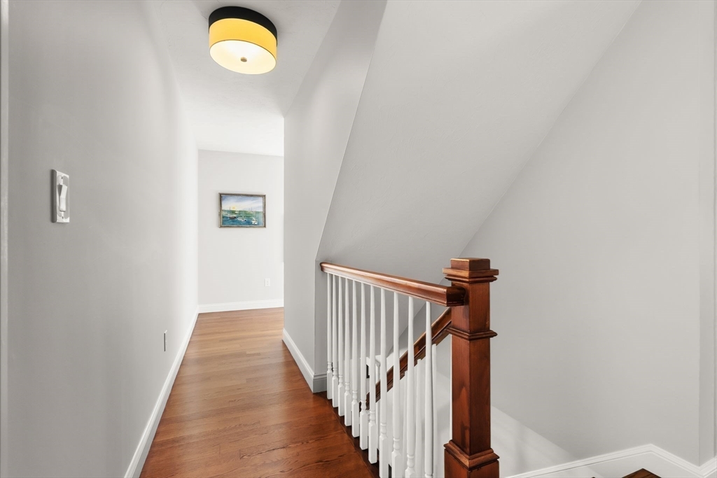 37 Moorland Road Scituate, MA 02066 - Photo 27 of 38 a view of a hallway with wooden floor