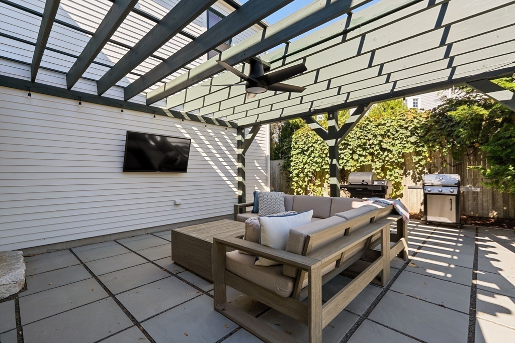 37 Moorland Road Scituate, MA 02066 - Photo 31 of 38 a bedroom with furniture and a flat screen tv