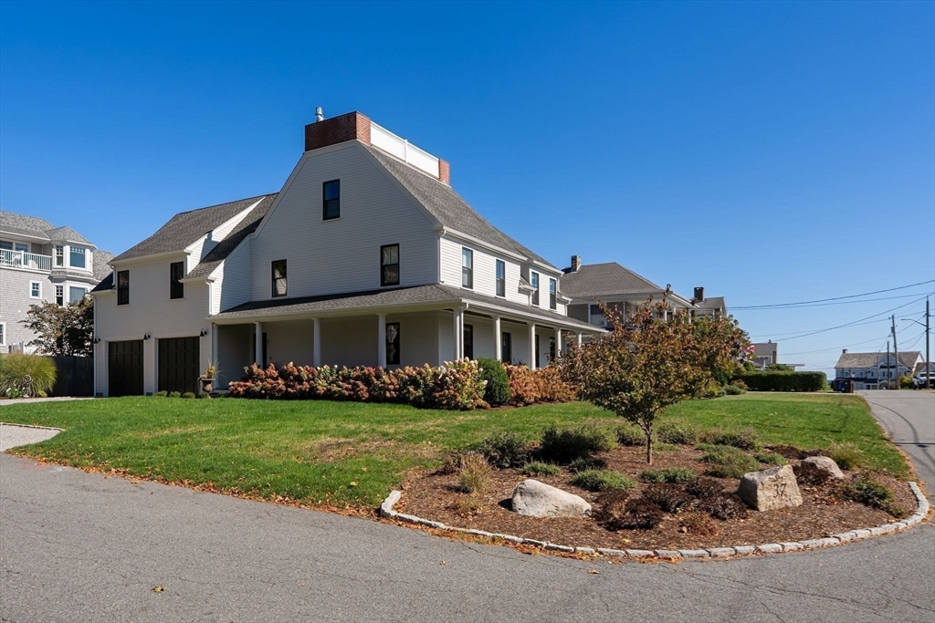 37 Moorland Road Scituate, MA 02066 - Photo 6 of 38 a front view of a house with a yard