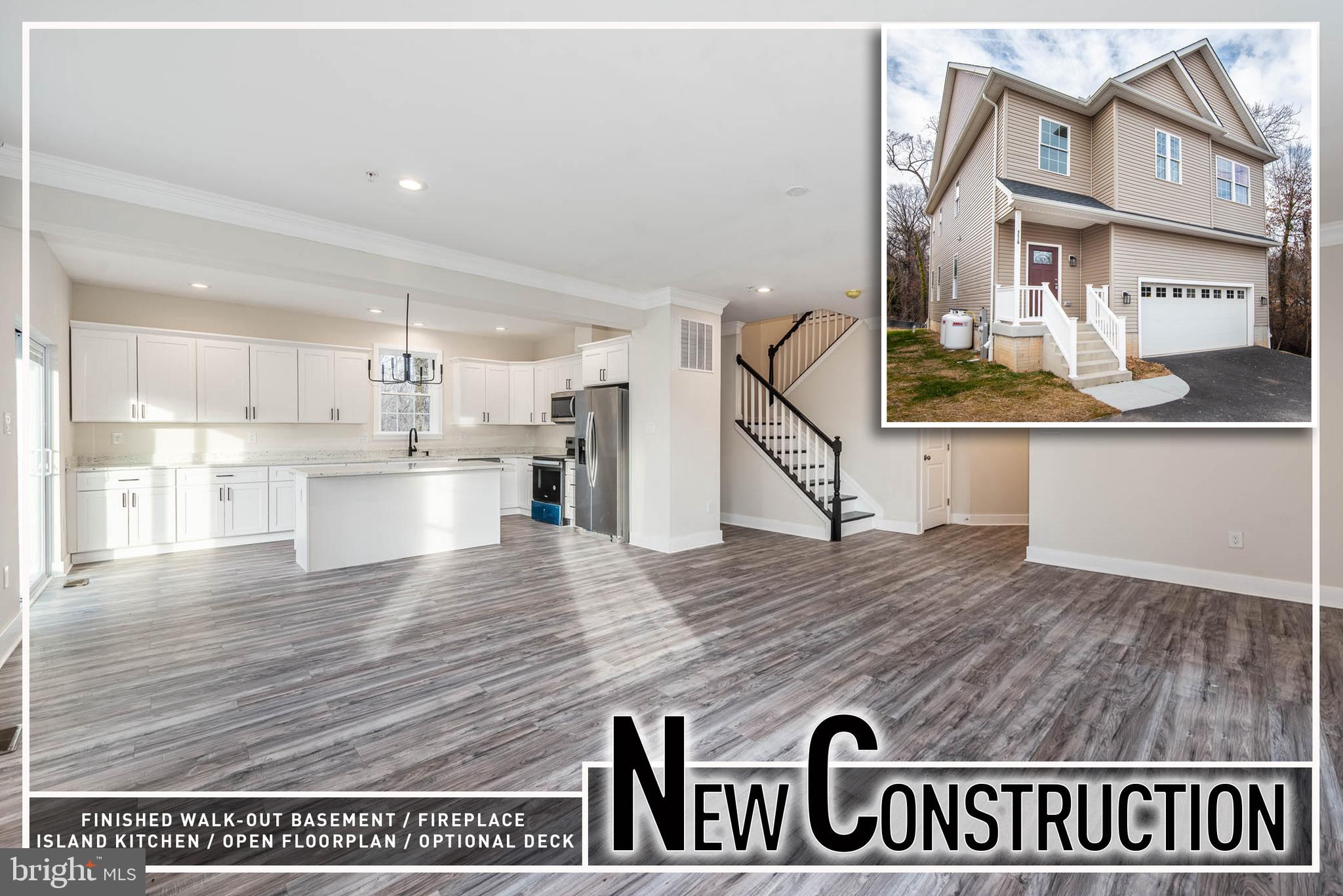 a view of kitchen and kitchen with sink microwave and refrigerator