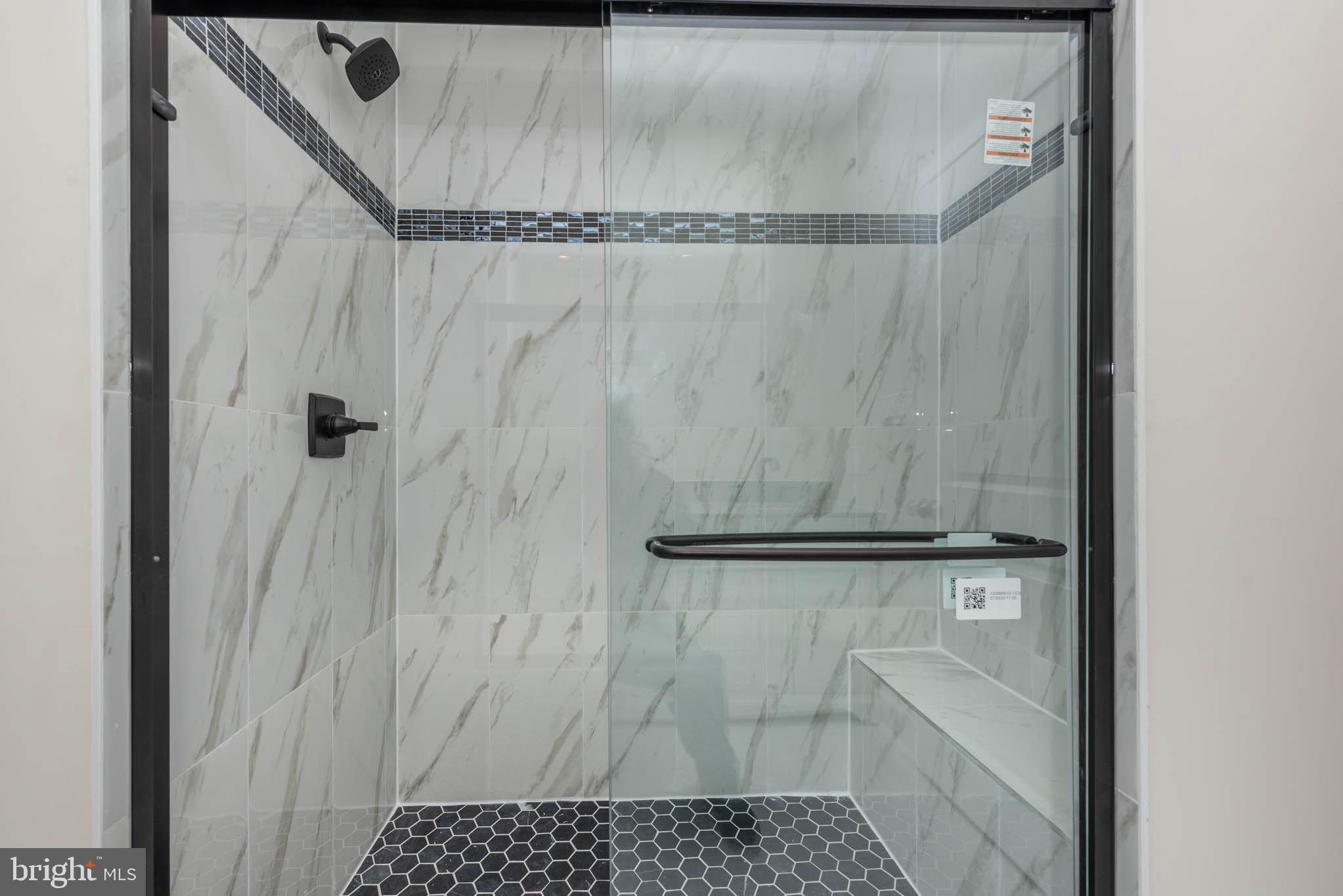 9626 Harford Road Parkville, MD 21234 - Photo 16 of 33 a bathroom with a shower