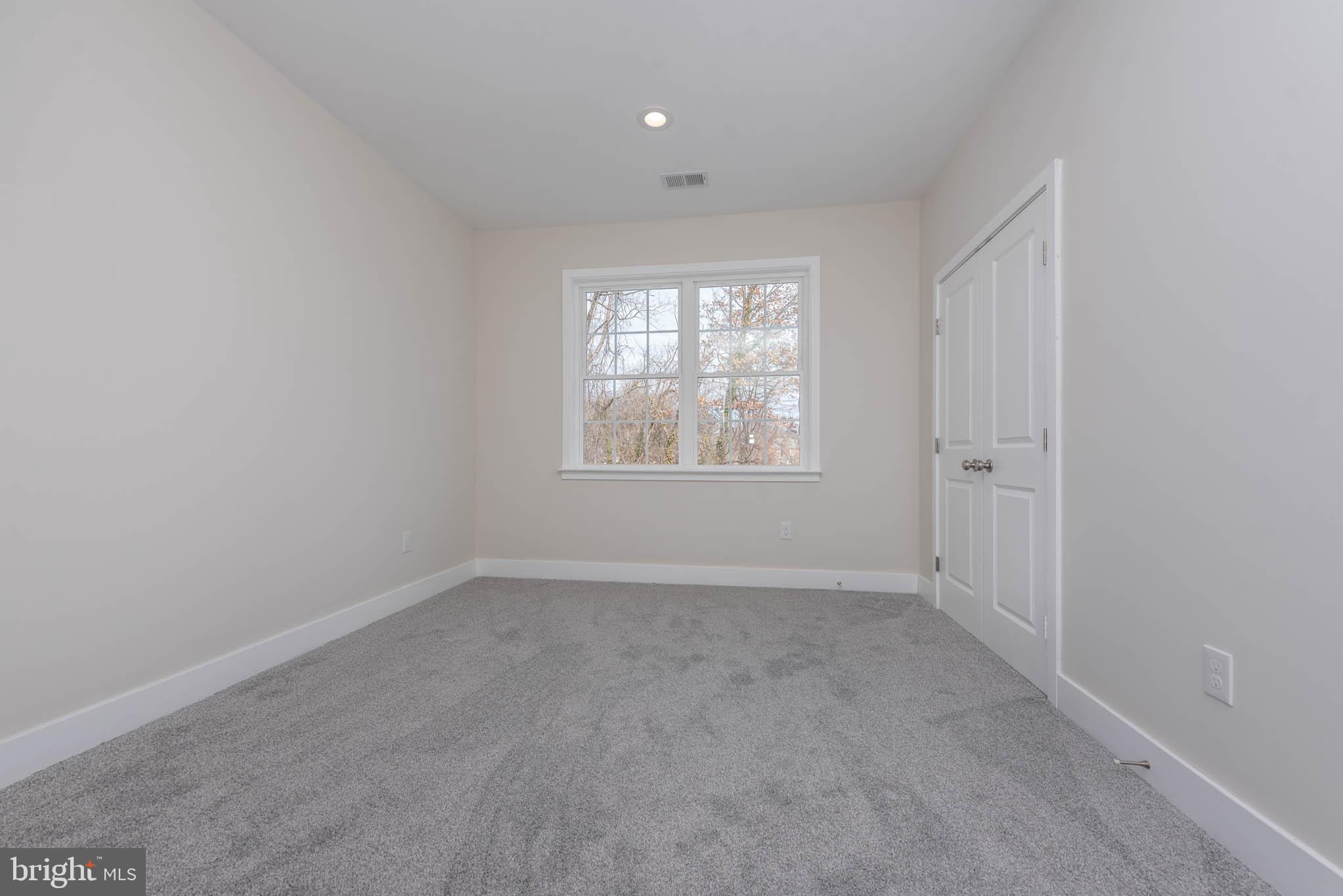 9626 Harford Road Parkville, MD 21234 - Photo 25 of 34 an empty room with windows