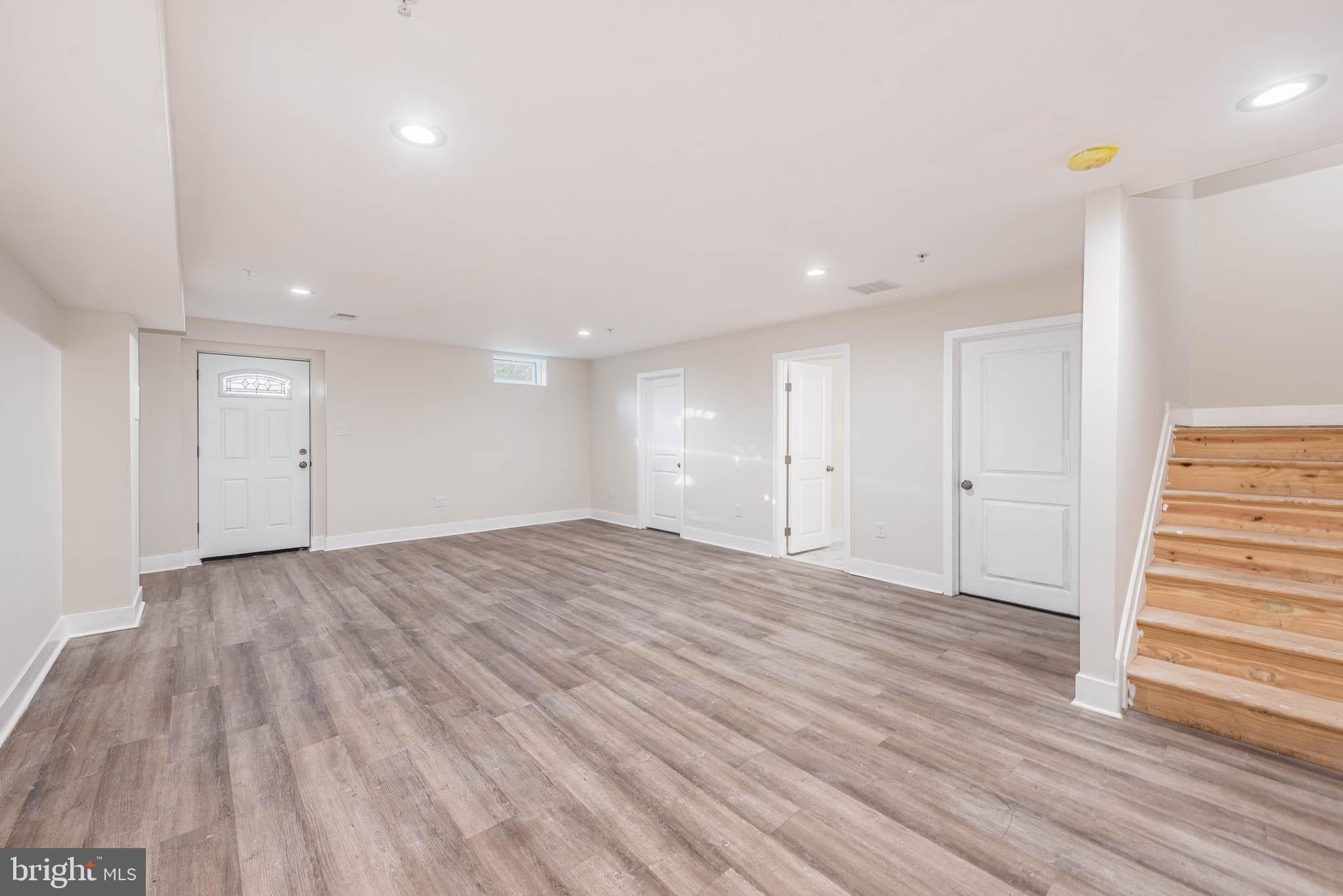 9626 Harford Road Parkville, MD 21234 - Photo 26 of 33 a view of empty room with wooden floor