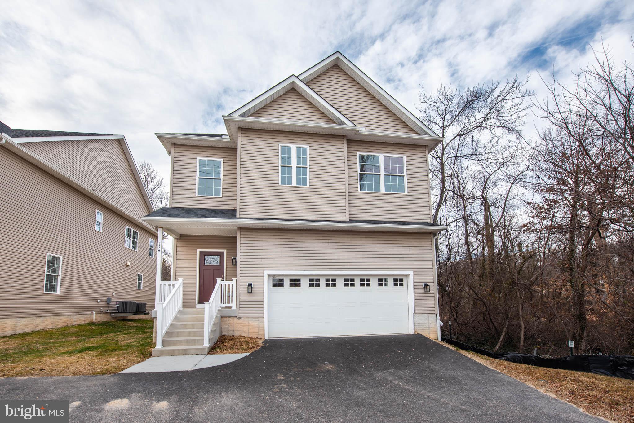 9626 Harford Road Parkville, MD 21234 - Photo 33 of 33 a front view of a house with a yard