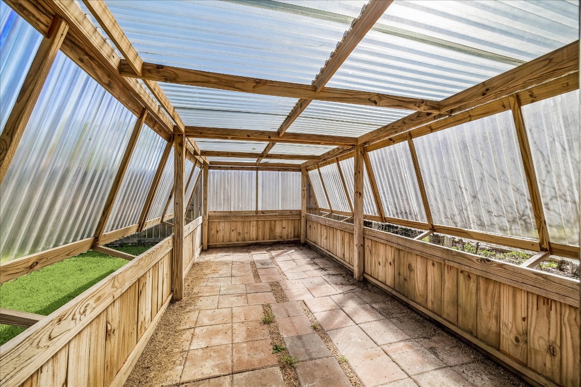 25732 Chestnut Lane Splendora, TX 77372 - Photo 26 of 27 Dedicated greenhouse space for gardening enthusiasts.