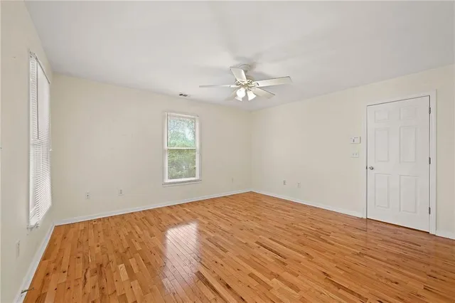 a view of a room with a large window