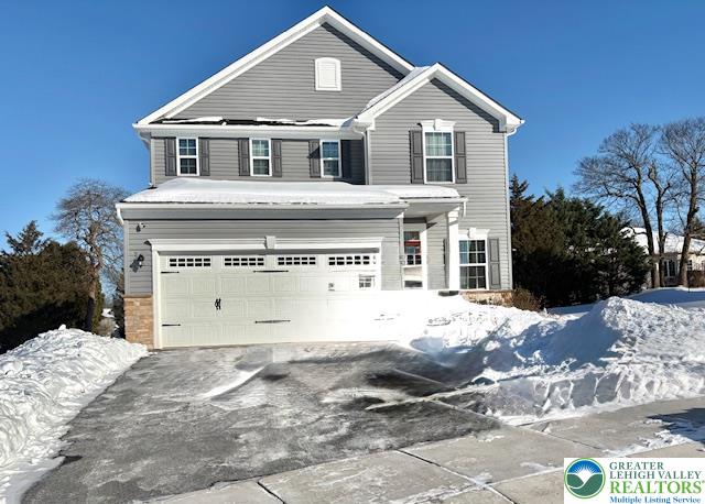 3951 Trythall Street Bethlehem, PA 18020 - Photo 2 of 25 a front view of a house with a yard