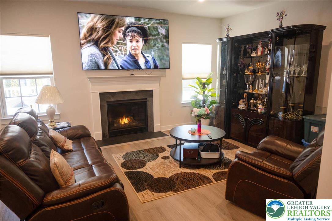 3951 Trythall Street Bethlehem, PA 18020 - Photo 6 of 25 a living room with furniture and a fireplace