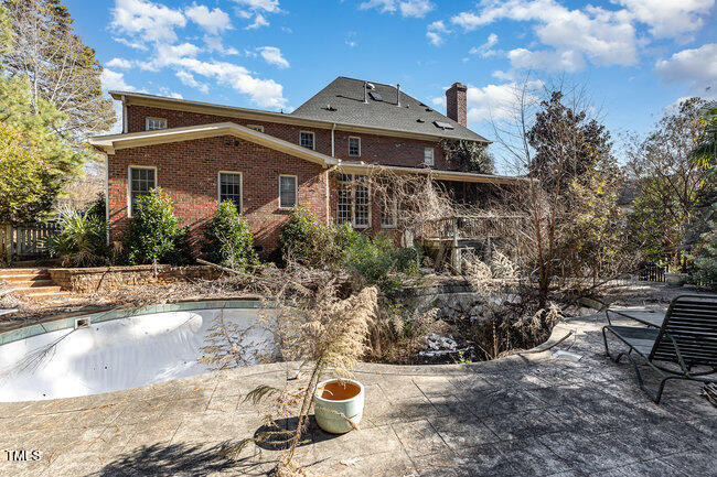 6613 Swallowtail Lane Raleigh, NC 27613 - Photo 5 of 7 a front view of a house with a yard