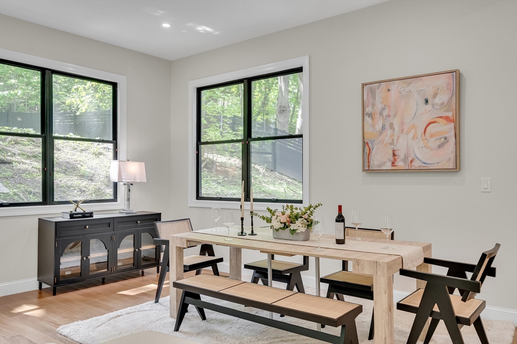 14-16 Summit Street Newton, MA 02458 - Photo 11 of 35 a view of a dining room with furniture window and outside view