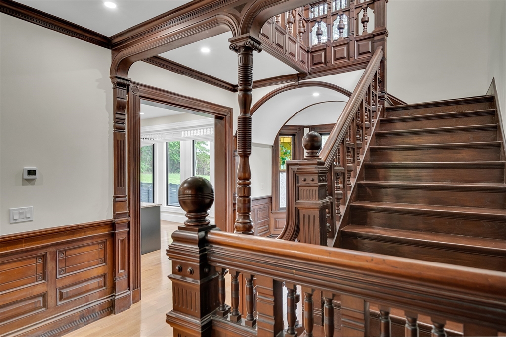 14-16 Summit Street Newton, MA 02458 - Photo 13 of 35 a view of a entryway with wooden floor and windows
