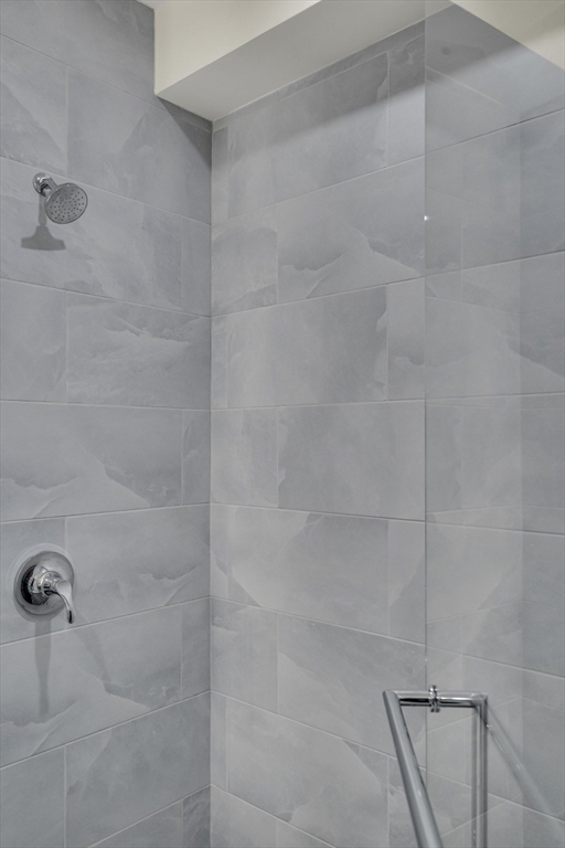 14-16 Summit Street Newton, MA 02458 - Photo 31 of 35 a bathroom with a shower