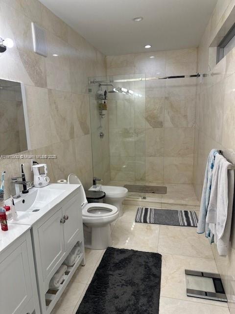 3089 Southwest 21st Street, Unit 3089 Miami, FL 33145 - Photo 6 of 15 a bathroom with a sink a toilet and shower