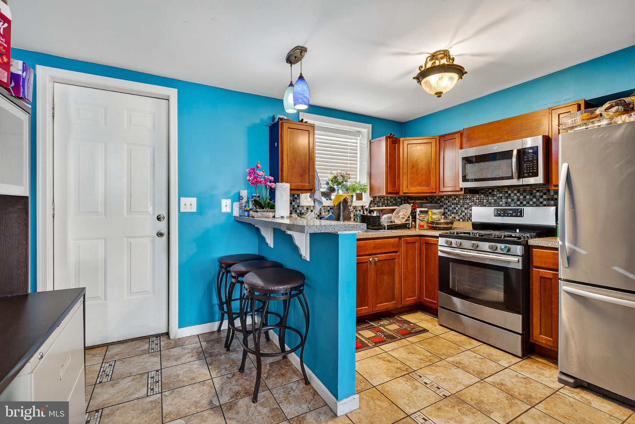 1109 Quantril Way Baltimore, MD 21205 - Photo 1 of 18 Vibrant kitchen with modern finishes.
