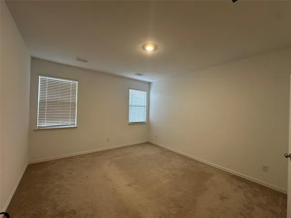 a storage room with a wooden floor