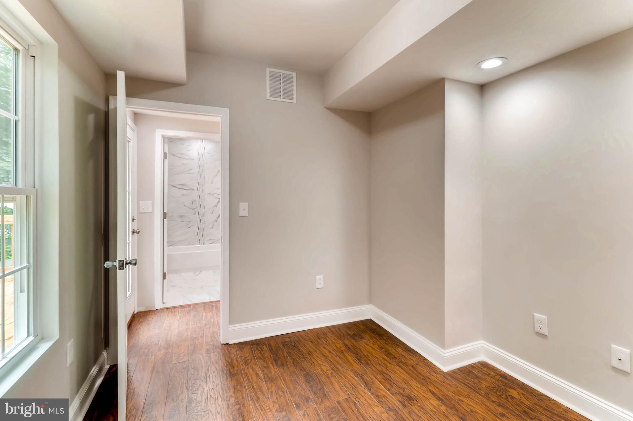 3905 Pinewood Avenue Baltimore, MD 21206 - Photo 13 of 30 Convenient Access to Deck or Main Level Full Bath