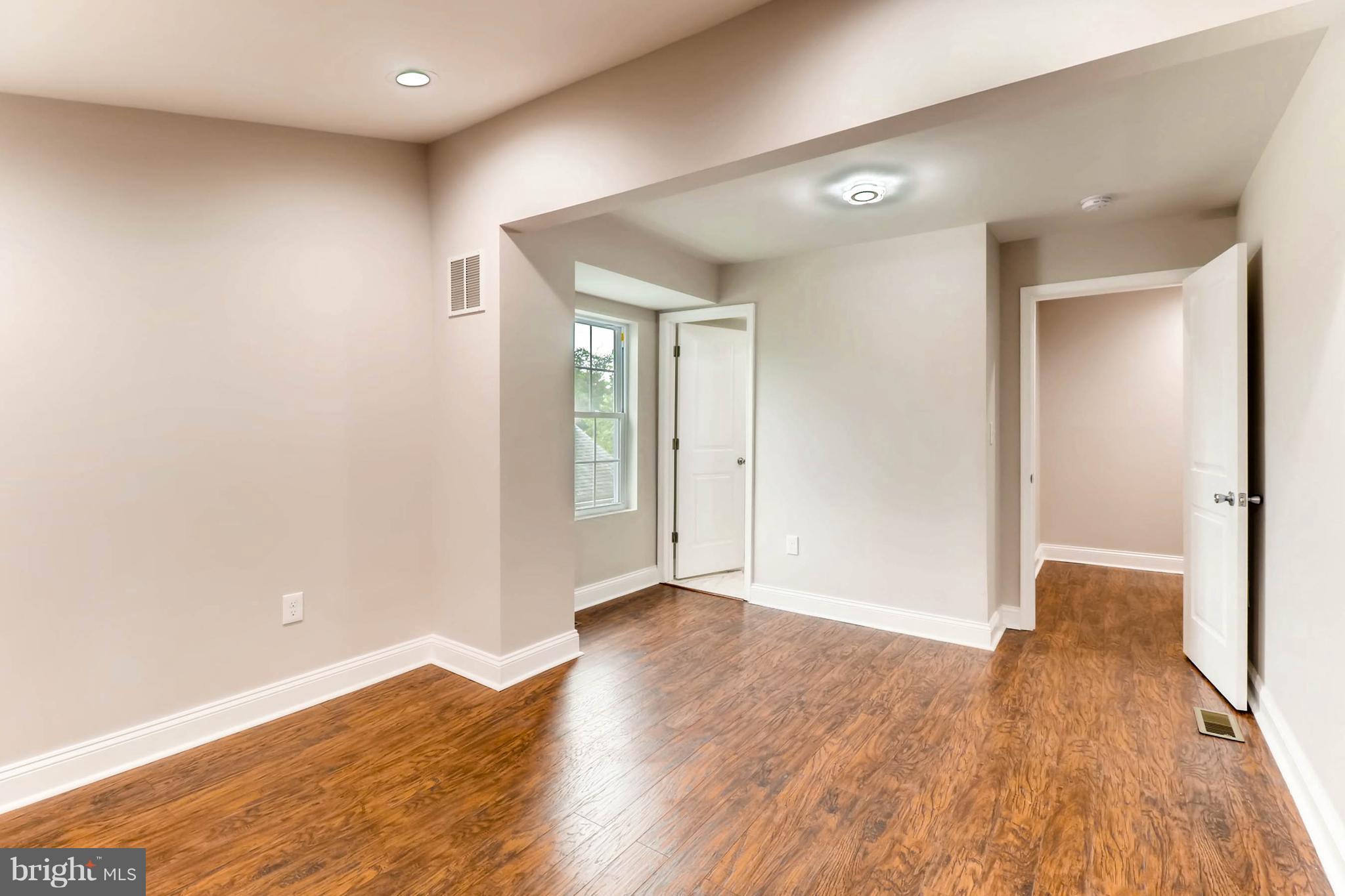 3905 Pinewood Avenue Baltimore, MD 21206 - Photo 24 of 30 Upper Level Bedroom with Ensuite Bathroom
