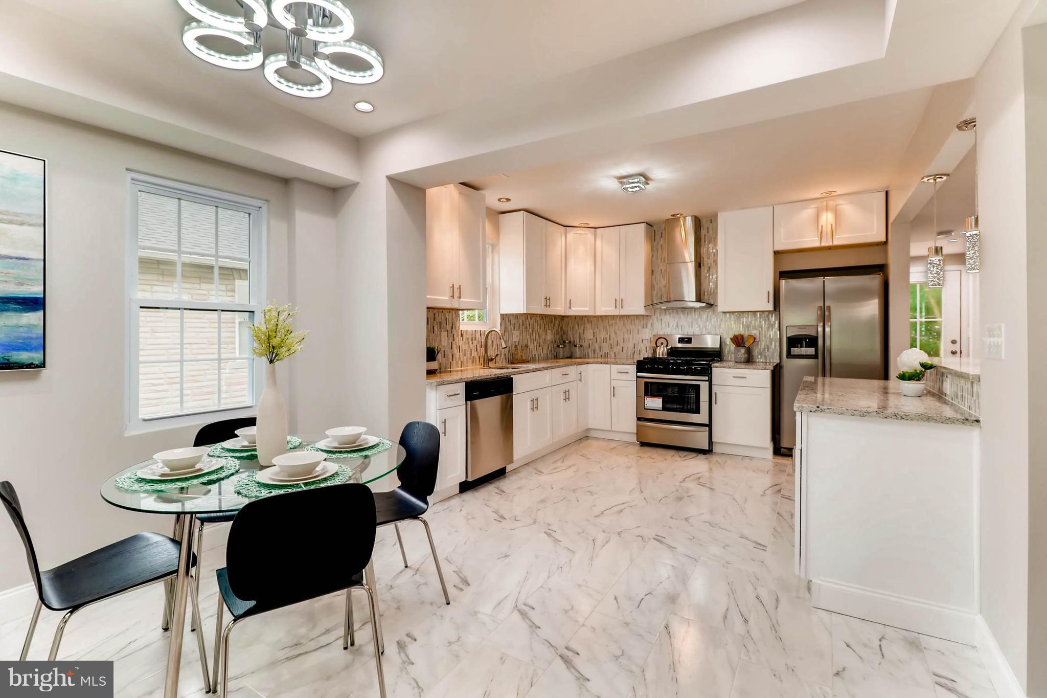 3905 Pinewood Avenue Baltimore, MD 21206 - Photo 4 of 30 Dining Room Open to Kitchen
