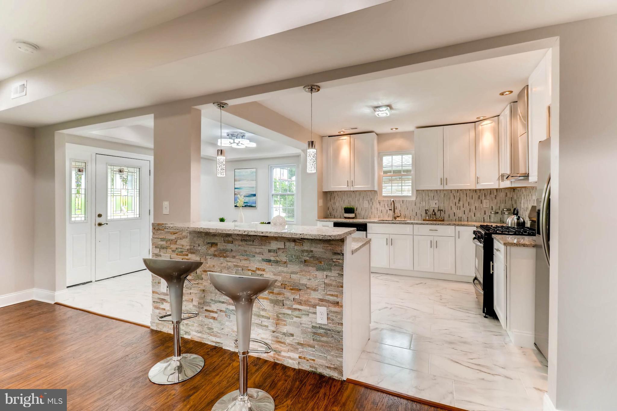 3905 Pinewood Avenue Baltimore, MD 21206 - Photo 8 of 30 Kitchen with a Breakfast Bar for a Quick Bite