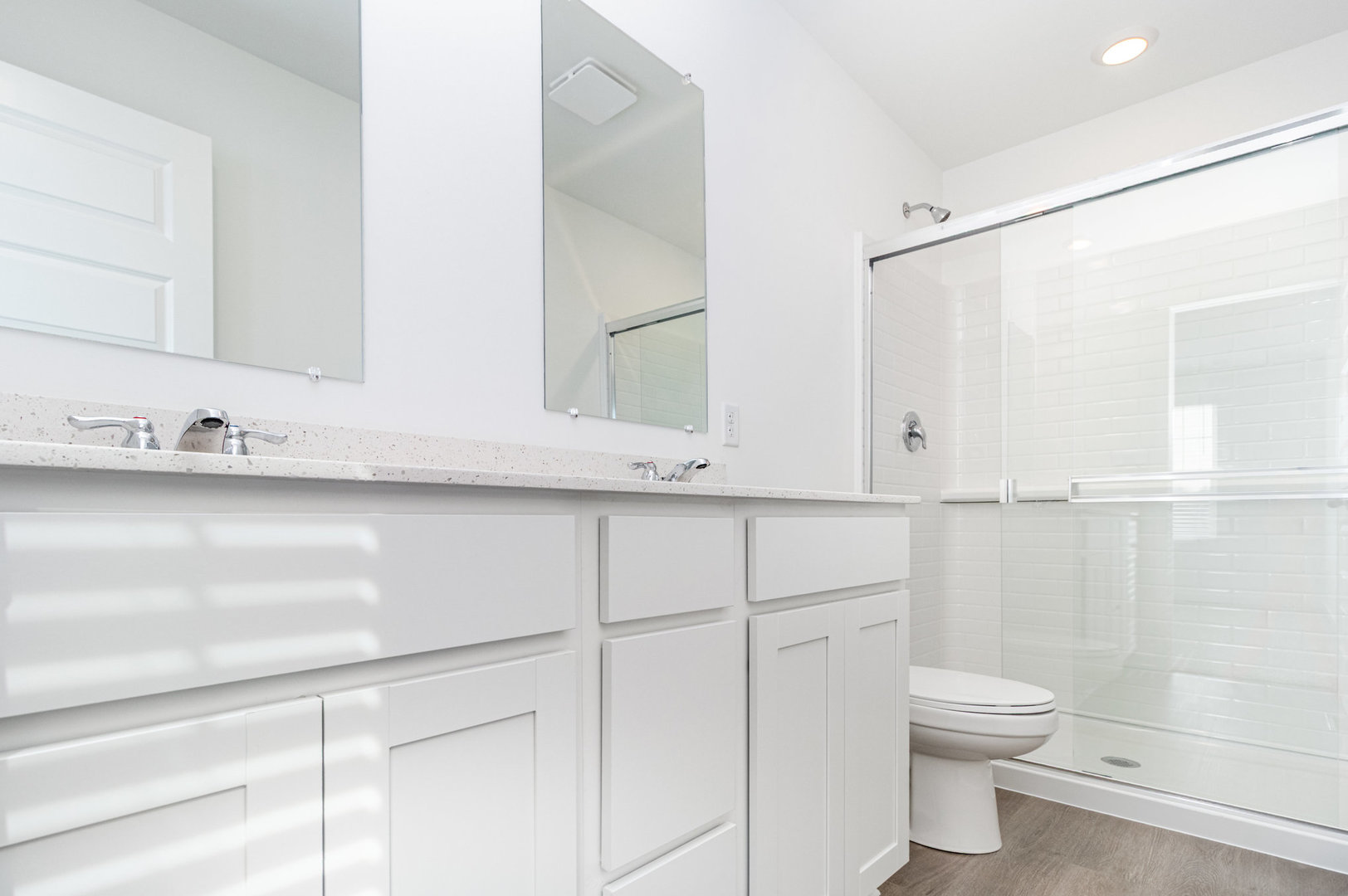 2171 Yellowstone Boulevard, Unit 2171 Mundelein, IL 60060 - Photo 14 of 23 a bathroom with a sink a toilet and shower