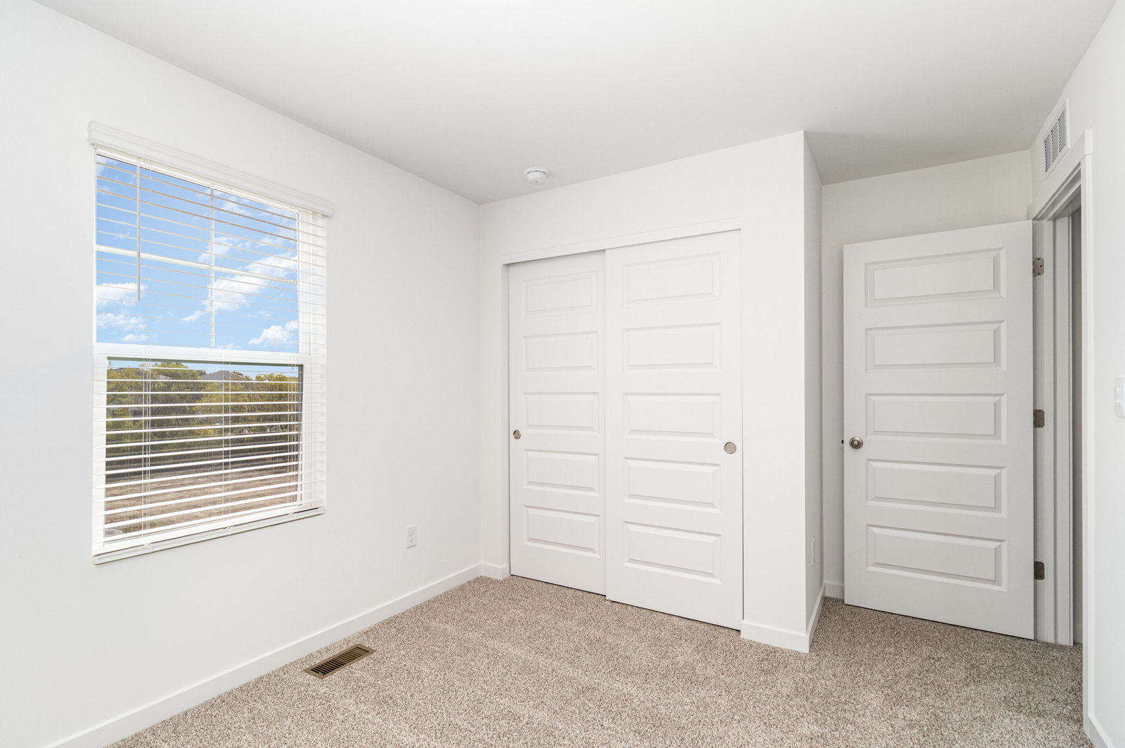 2171 Yellowstone Boulevard, Unit 2171 Mundelein, IL 60060 - Photo 16 of 23 a view of an empty room with a window and cabinet