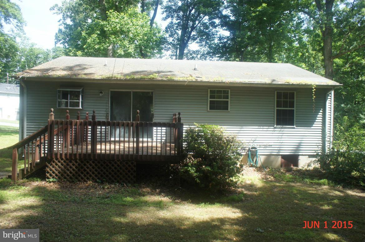 1109 Range Road Lusby, MD 20657 - Photo 2 of 11 a side view of a house