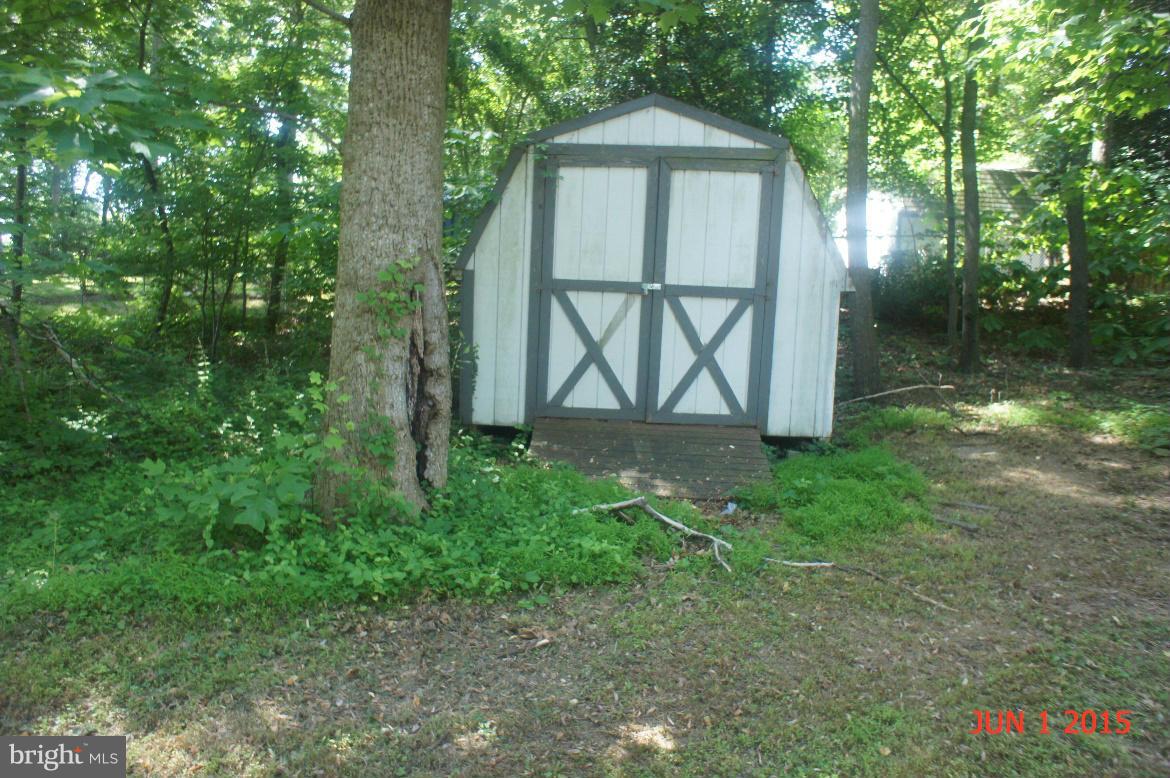 1109 Range Road Lusby, MD 20657 - Photo 3 of 11 a view of entryway with garden
