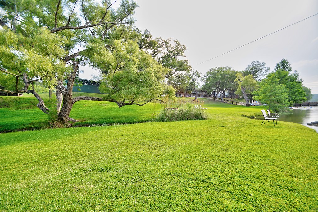 2960 Highway 39 Hunt, TX 78024 - Photo 11 of 23 a view of yard with swimming pool and green space