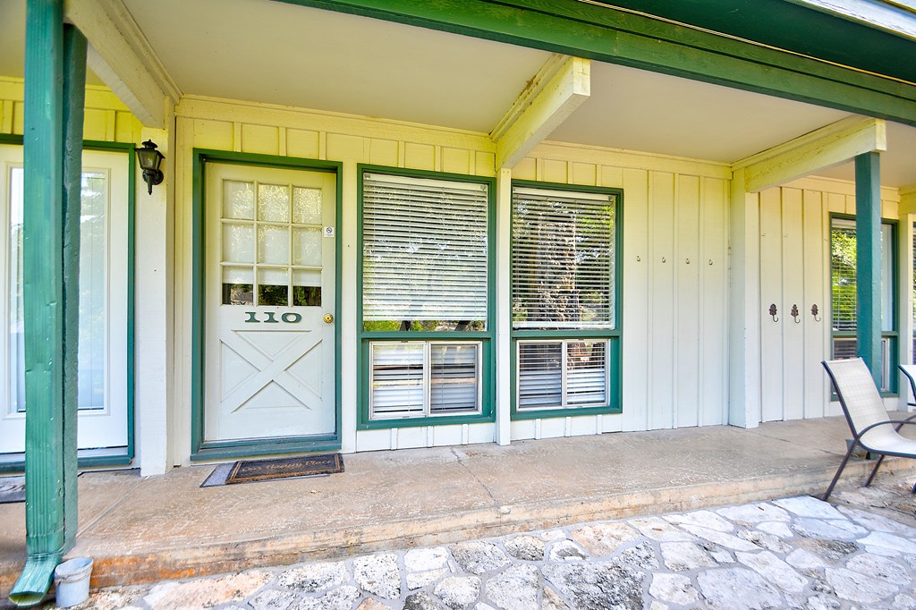 2960 Highway 39 Hunt, TX 78024 - Photo 2 of 23 a view of a bedroom with wooden floor and a outdoor space