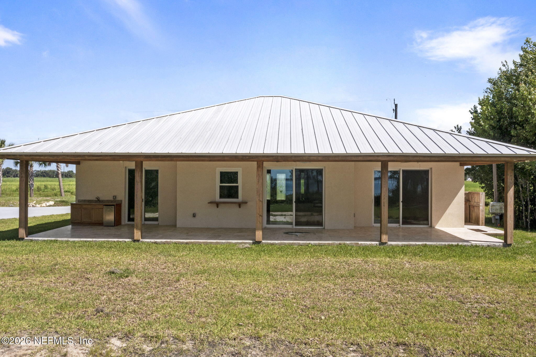 159 Mays Cove Road East Palatka, FL 32131 - Photo 36 of 62 a front view of a house with garden