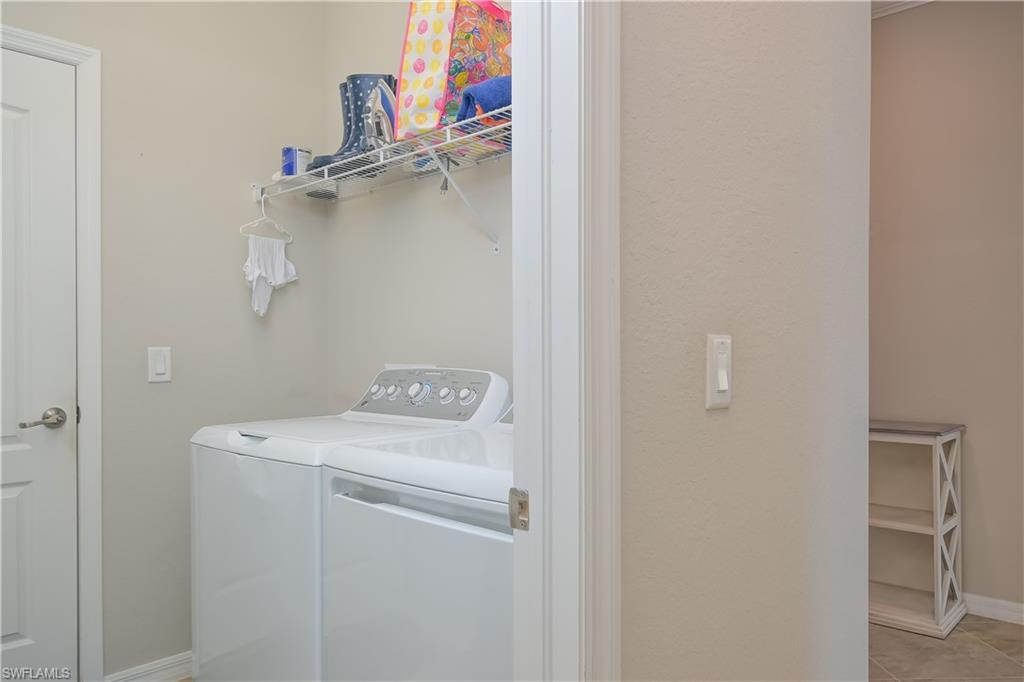 2076 Hamlin Street Naples, FL 34120 - Photo 17 of 24 a utility room with dryer and washer