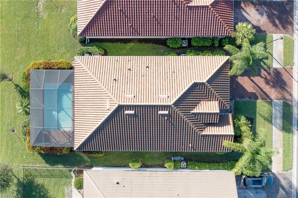 2076 Hamlin Street Naples, FL 34120 - Photo 24 of 24 a view of front of a house with a yard