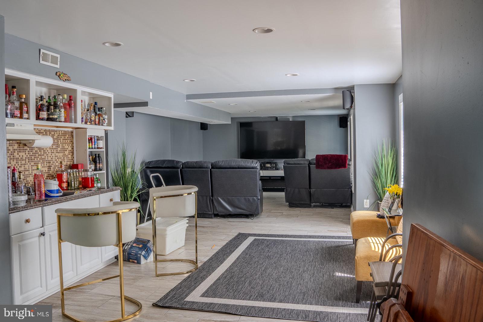 9737 Eustice Road Randallstown, MD 21133 - Photo 28 of 30 Modern entertainment space with style.