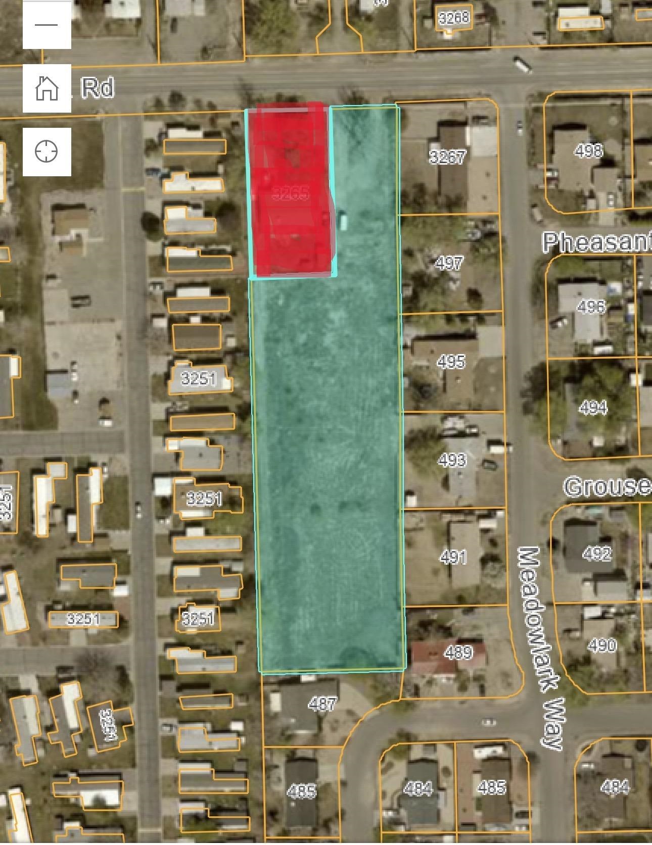 a front view of a building with outdoor space