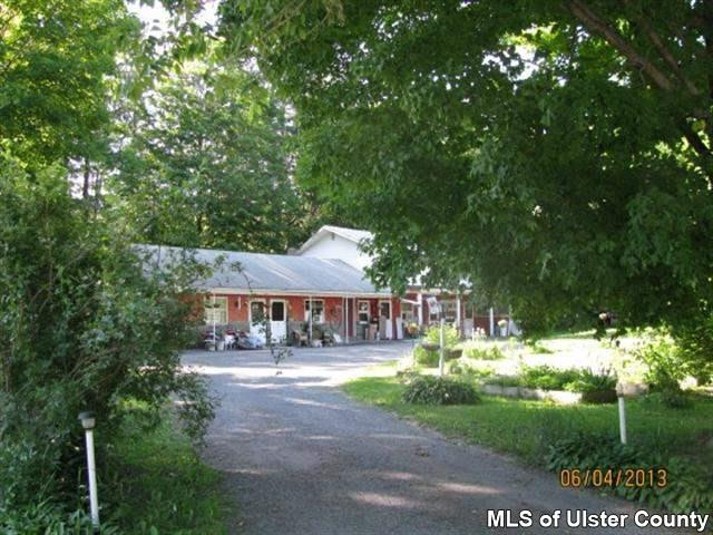 5 Ruthenbeck Road Shandaken, NY 12480 - Photo 3 of 16 a backyard of a house with yard and outdoor seating